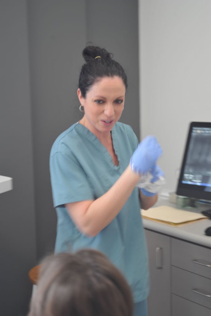 Oral surgery employee, dental exam, Dr. Consky 